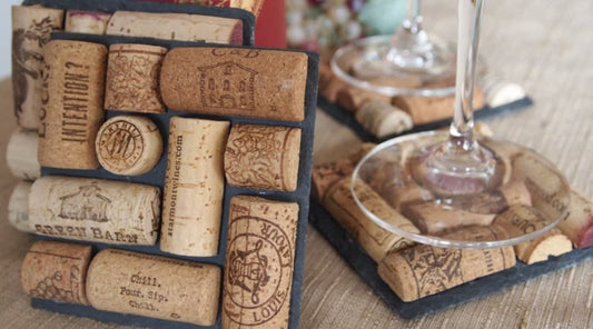 coasters made of cork, one wine glass standing on it